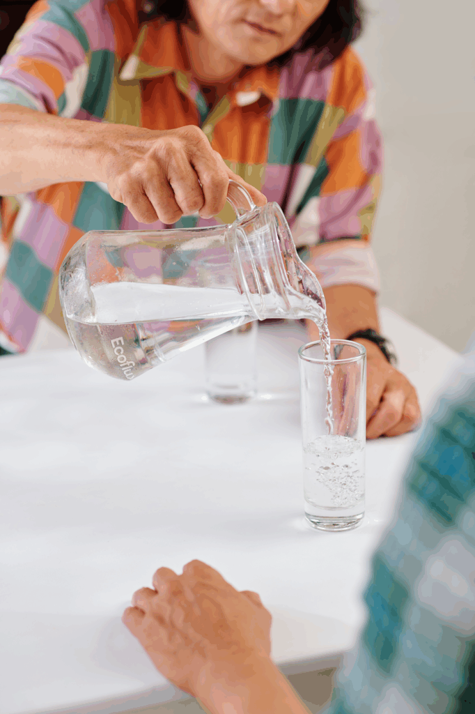 pouring-glass-of-water-for-friend-2025-02-11-13-54-27-utc
